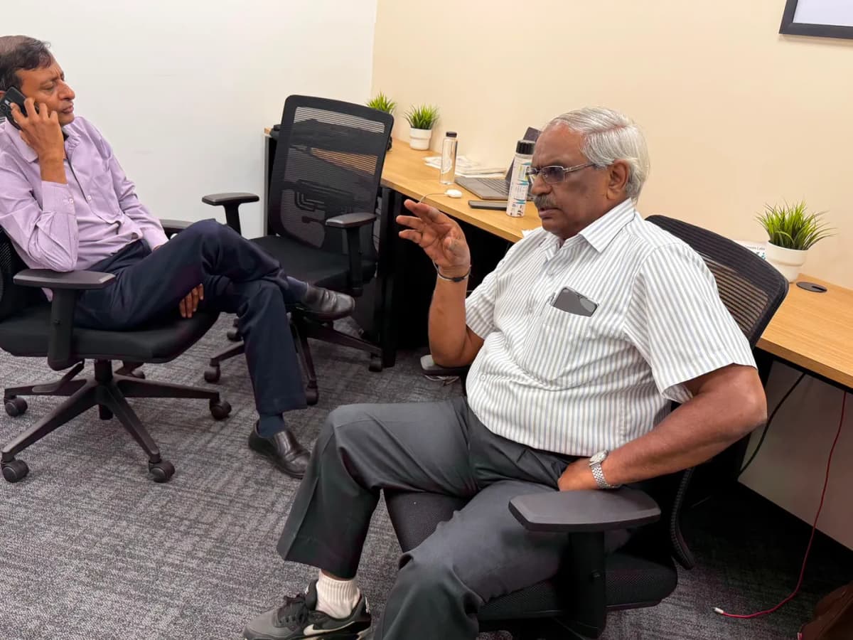 Team members in discussion at the office