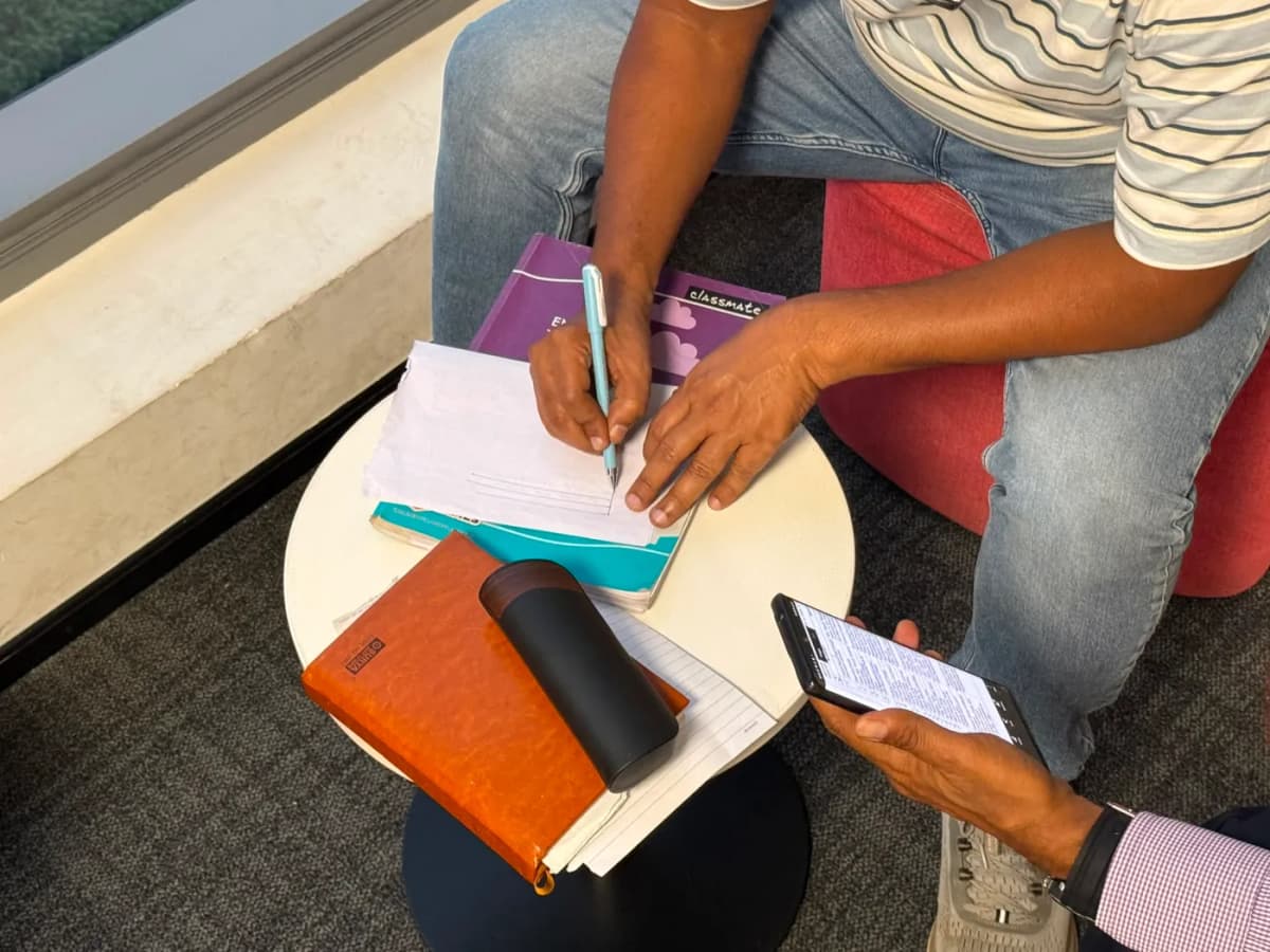 Two team members sketching out a project plan